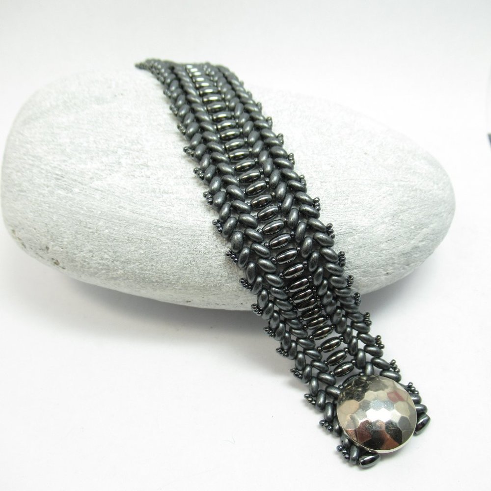 Hematite woven bracelet with button